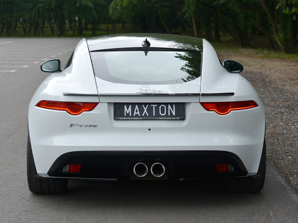 Maxton Design Jaguar F-Type spoiler in carbon fiber with aerodynamic styling, mounted on the rear of the sports car.