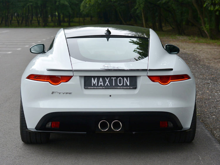 Maxton Design Jaguar F-Type spoiler in carbon fiber with aerodynamic styling, mounted on the rear of the sports car.