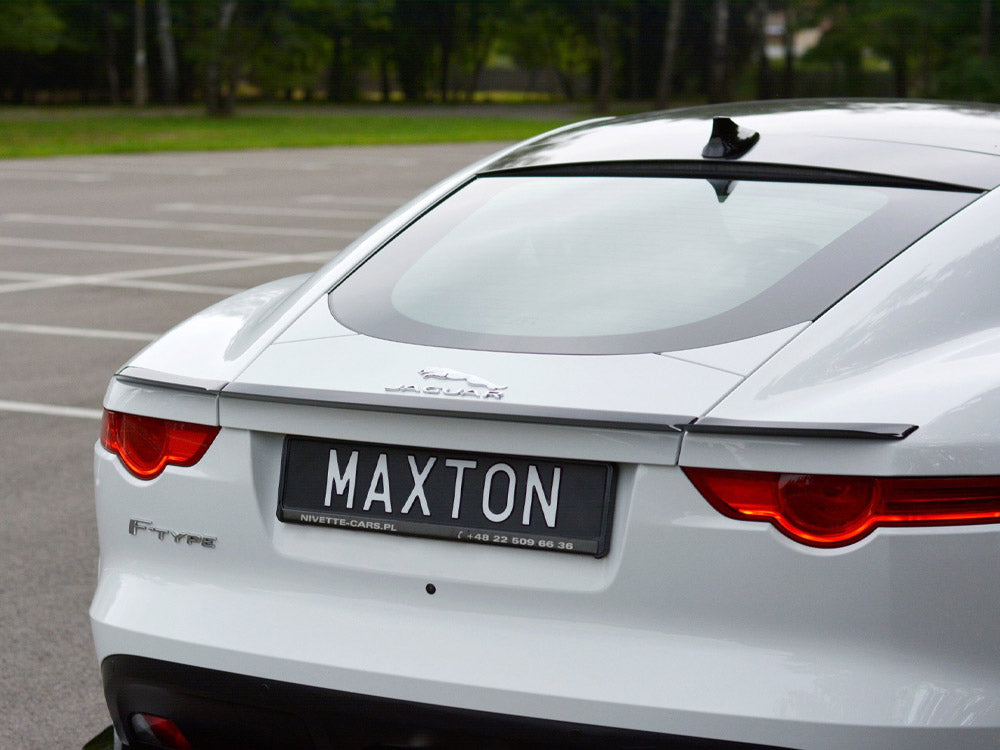 Maxton Design spoiler CAP for Jaguar F-Type, black body styling part, shown on a sleek car with aerodynamic design.