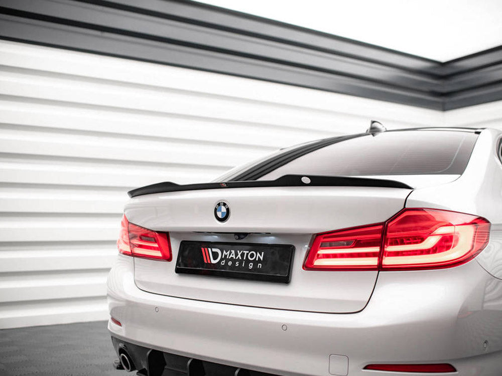 MAXTON® DESIGN spoiler CAP V.1 for BMW 5 Series G30 sedan, shown installed on the vehicle's rear trunk lid.