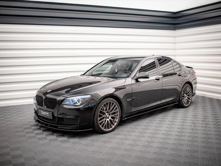 Maxton Design BMW 7 Series F01 side skirts and diffusers in black, designed for sporty, aerodynamic enhancement.