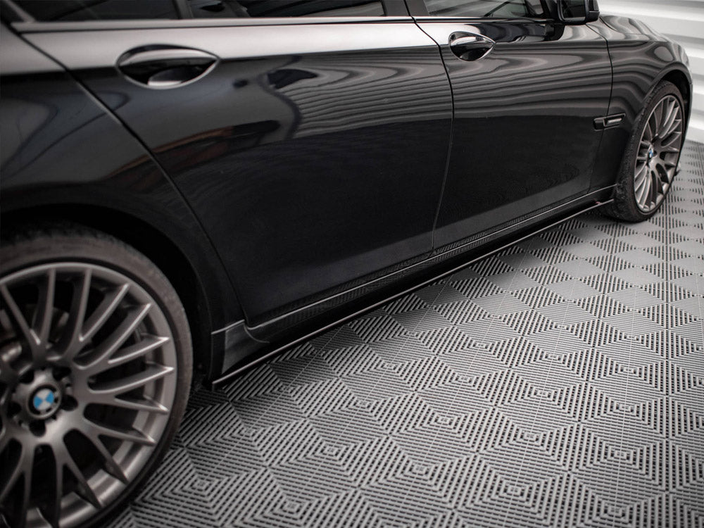 Maxton Design BMW 7 Series F01 M-Pack side skirts and diffusers in black, aerodynamic exterior car styling accessories.