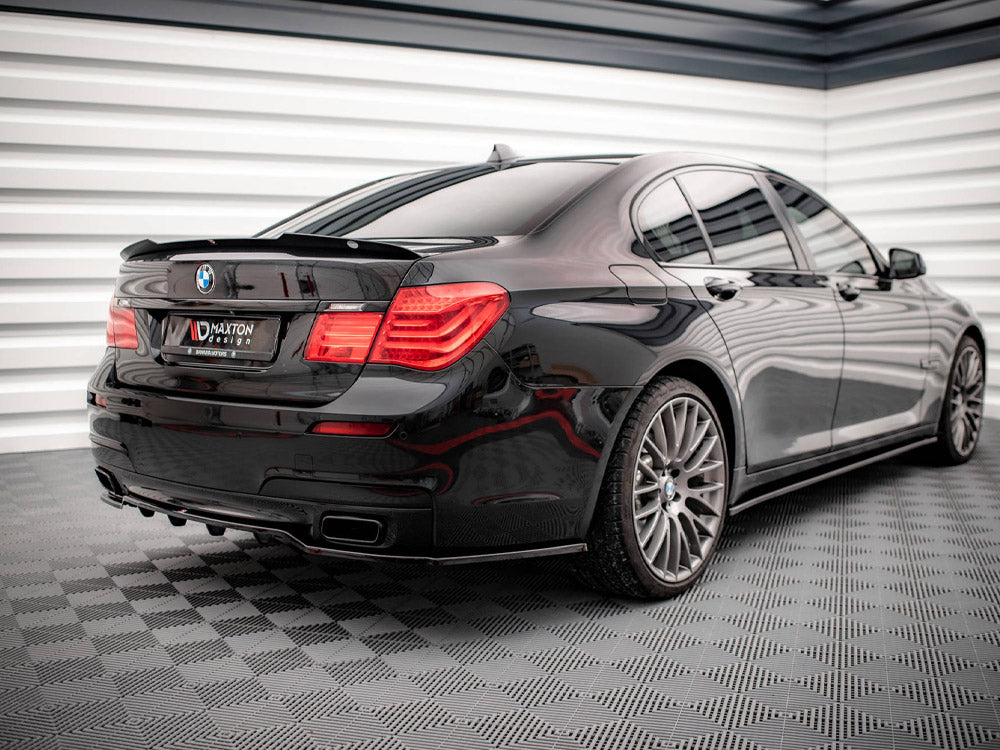 Maxton Design rear splitter with vertical bars for BMW 7 Series F01 M-Pack, made of durable material with a sleek finish