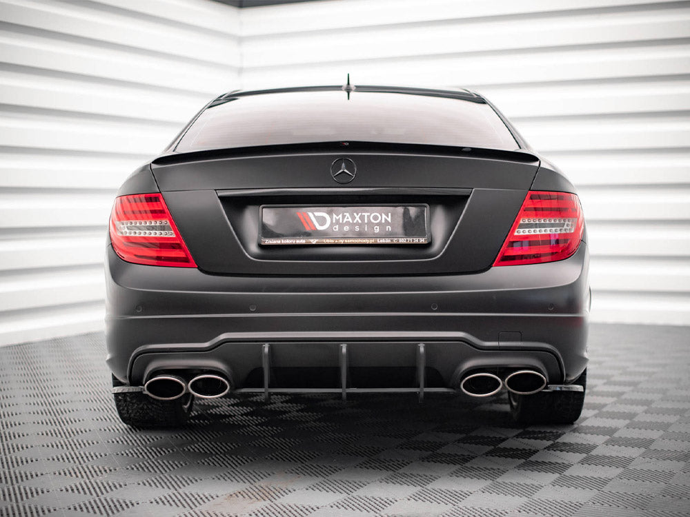 Maxton Design Mercedes-Benz C-Class Coupe spoiler in carbon fiber for C204 AMG-Line and standard models, mounted on the vehicle.
