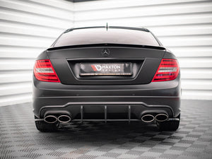 Maxton Design Mercedes-Benz C-Class Coupe spoiler in carbon fiber for C204 AMG-Line and standard models, mounted on the vehicle.
