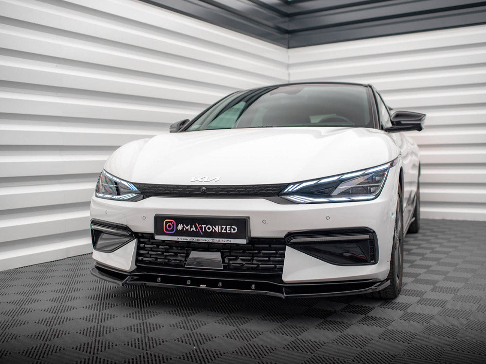 Maxton Design Front Splitter V.2 for Kia EV6 GT-Line Mk1, black aerodynamic body styling accessory, mounted on the front of the vehicle.