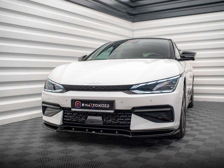 Maxton Design Front Splitter V.2 for Kia EV6 GT-Line Mk1, black aerodynamic body styling accessory, mounted on the front of the vehicle.