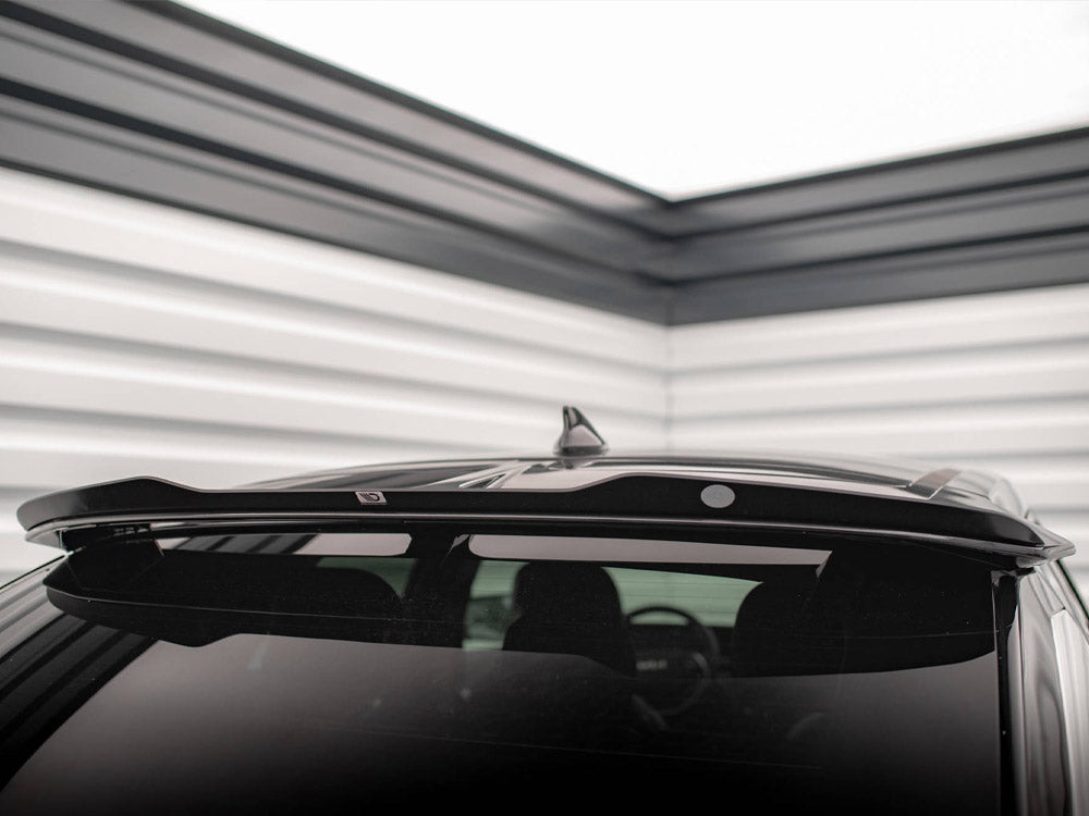 Maxton Design Kia EV6 GT-Line Mk1 upper spoiler cap in body and styling, black aerodynamic component on car's rear.