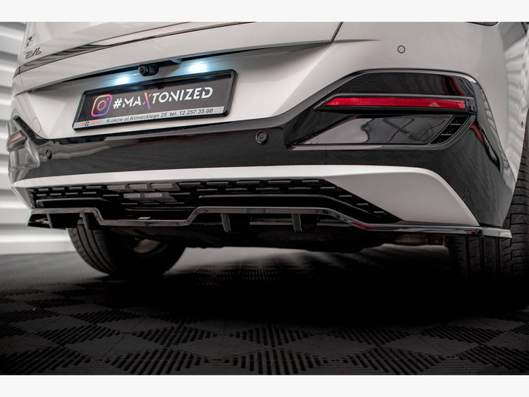 Maxton Design rear splitter with vertical bars for Kia EV6 GT-Line Mk1, a body styling accessory mounted at the vehicle's rear.