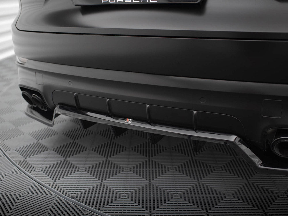 Maxton Design Porsche Cayenne Sport Mk3 rear central splitter with vertical bars for body and styling enhancement.
