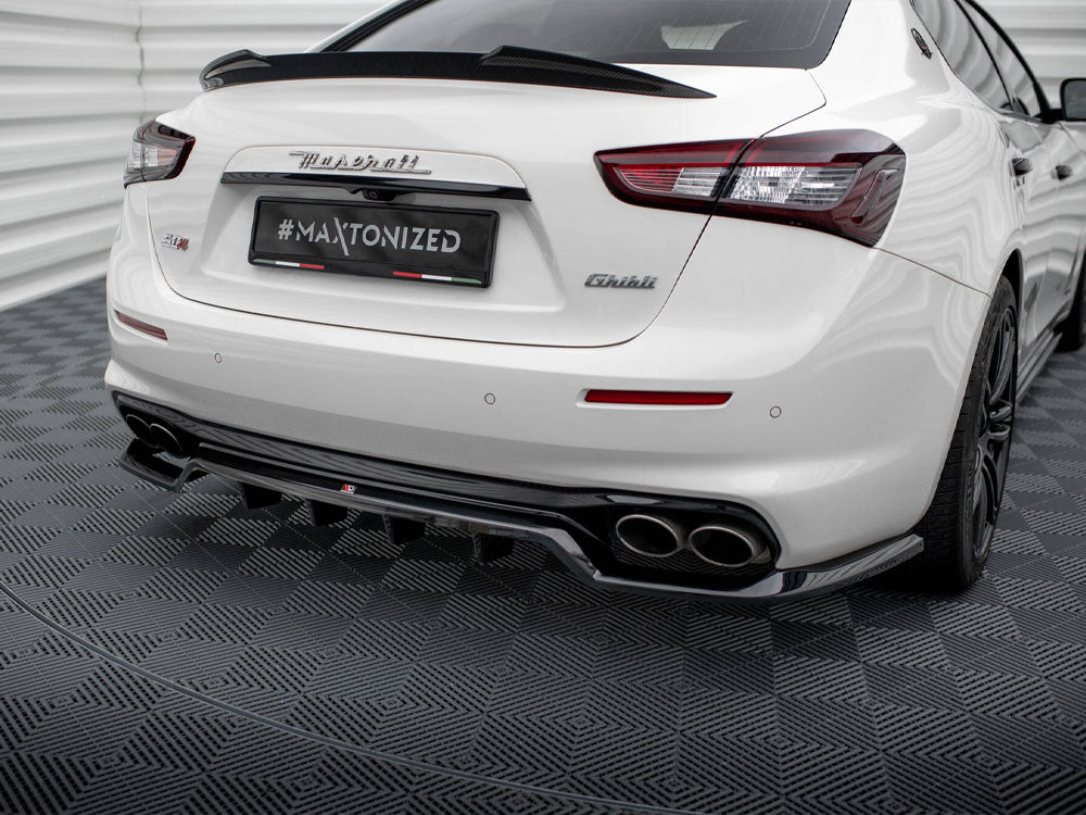 Maxton Design Maserati Ghibli Mk3 Facelift rear splitter with vertical bars, body and styling accessory for enhanced vehicle appearance.