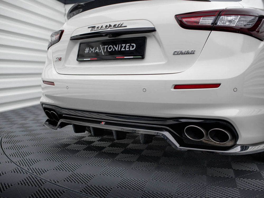Maxton Design Maserati Ghibli Mk3 facelift rear splitter with vertical bars, body and styling accessory in black finish.