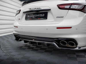Maxton Design Maserati Ghibli Mk3 facelift rear splitter with vertical bars, body and styling accessory in black finish.
