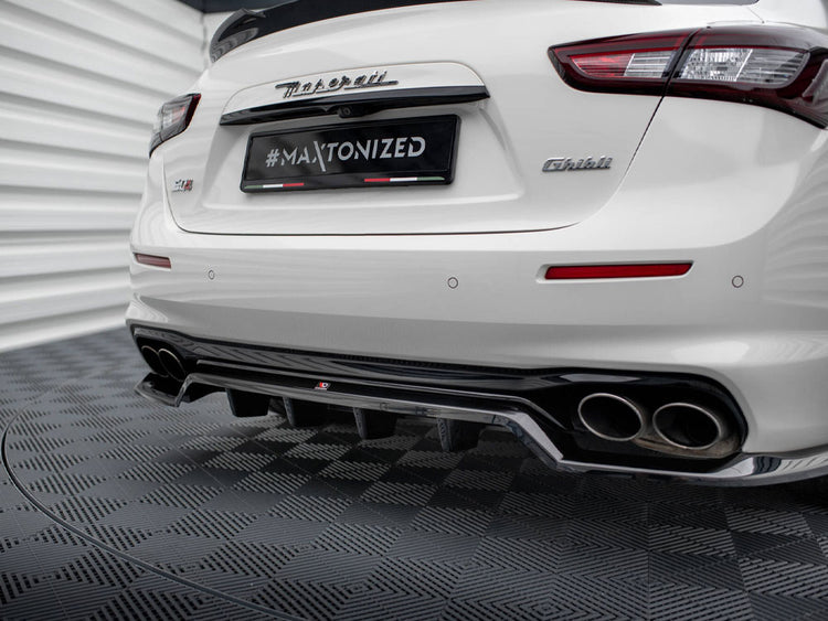 Maxton Design Maserati Ghibli Mk3 facelift rear splitter with vertical bars, body and styling accessory in black finish.