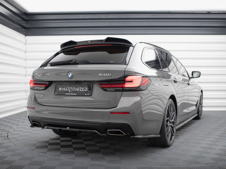 Maxton Design CAP 3D V.1 spoiler for BMW 5 Series Touring G31, black body styling accessory, shown on the vehicle.