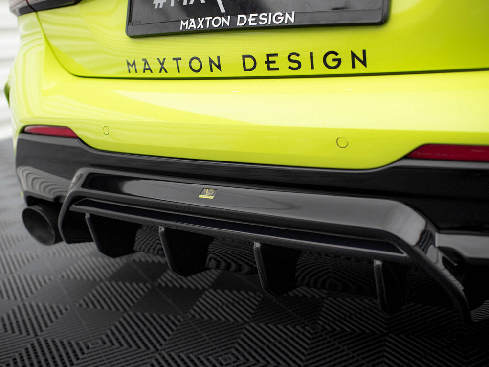 Maxton Design Rear Valance V1 for BMW M135i and 1 Series M Sport F40, body and styling car accessory, front view.