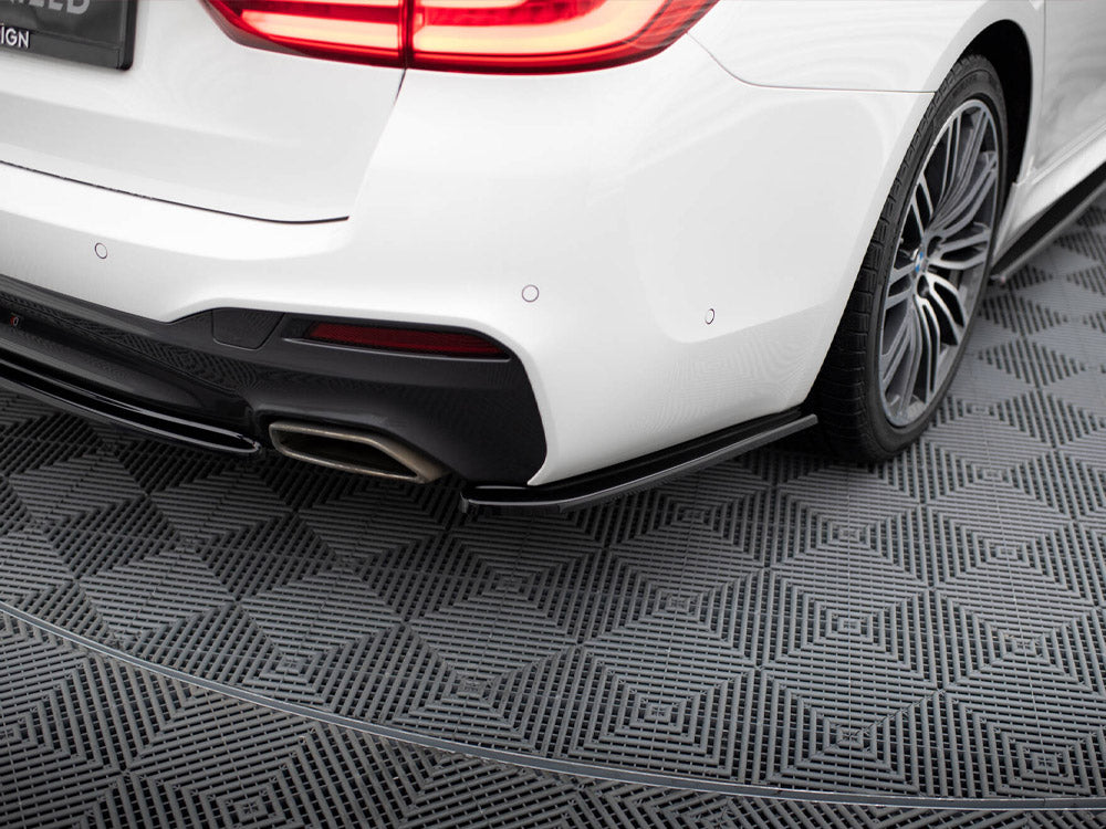 BMW 5 G30 G31 M-Sport central rear splitter by MAXTON DESIGN, showing the aerodynamic component installed on the car's rear bumper.