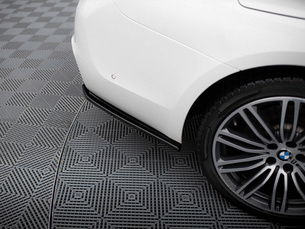 BMW 5 G30 G31 M-Sport central rear splitter by MAXTON® DESIGN, shown installed on the rear lower bumper of the vehicle.
