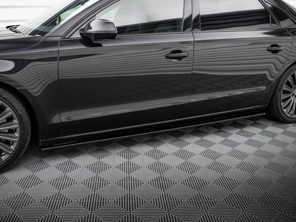 Maxton Design Audi A8 D4 side skirts and diffusers in black, designed for 2009-2013 model with sleek body styling.