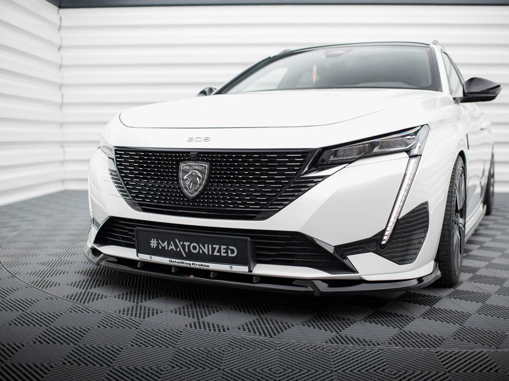 Maxton Design Peugeot 308 GT Mk3 front splitter in black, made of durable body and styling material, installed on the car's front bumper.