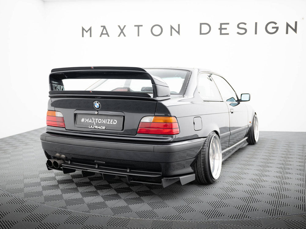 Maxton Design rear diffuser for BMW M3 E36 coupe and cabrio, M-Pack style, made of black aerodynamic plastic.