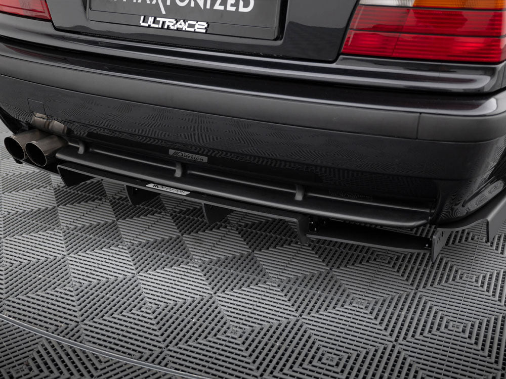Maxton Design rear diffuser for BMW M3 E36 coupe and cabrio, featuring sleek aerodynamic design and high-quality black finish.