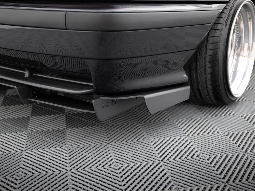 Maxton Design rear diffuser for BMW M3 E36 coupe and cabrio with M-Pack, showcasing sleek black aerodynamic styling.