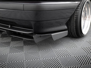 Maxton Design rear diffuser for BMW M3 E36 coupe and cabrio with M-Pack, showcasing sleek black aerodynamic styling.