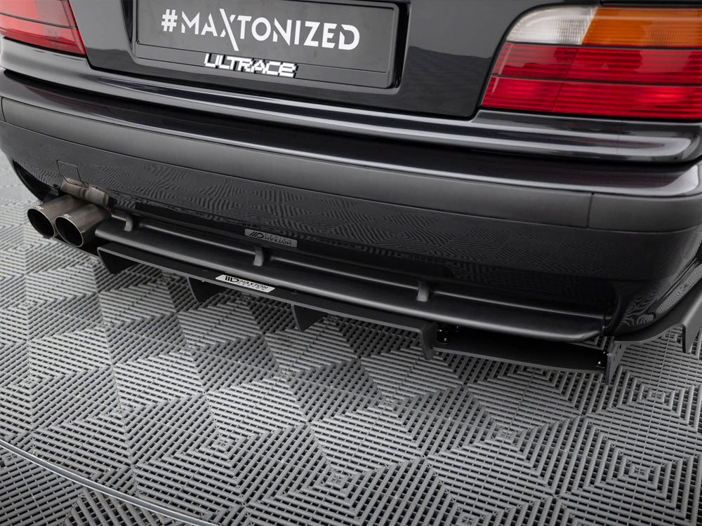 Maxton Design rear diffuser for BMW M3 E36 coupe and Cabrio, part of the M-Pack, showcasing sleek aerodynamic design.