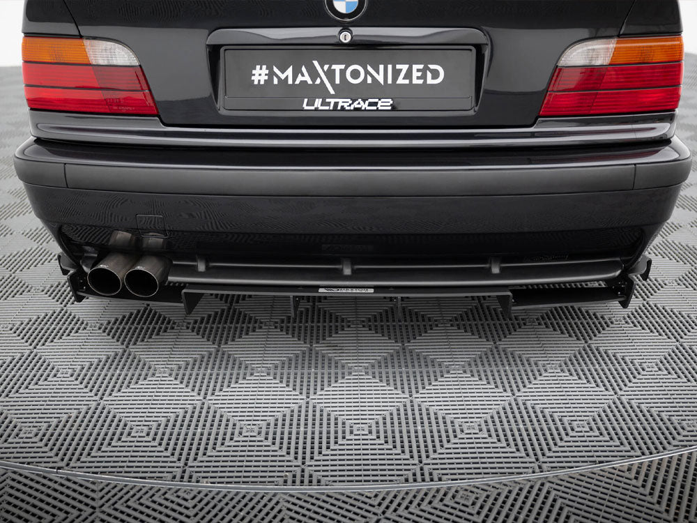 Maxton Design rear diffuser for BMW M3 E36 Coupe and Cabrio, M-Pack, in black with aerodynamic vents and sleek design.
