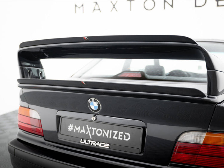 Maxton Design BMW M3 E36 coupe with M-Pack bottom spoiler, black body styling part for enhanced aerodynamics and sporty look.