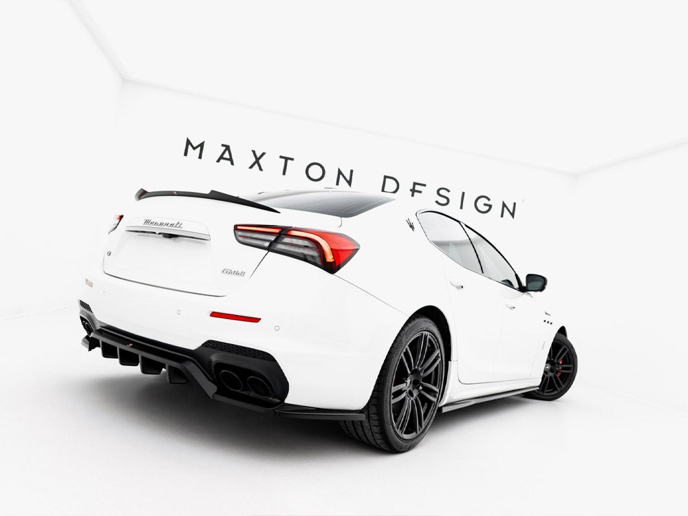 MASTON® DESIGN spoiler cap for Maserati Ghibli Mk3, showing sleek aerodynamic design in black with mounting details