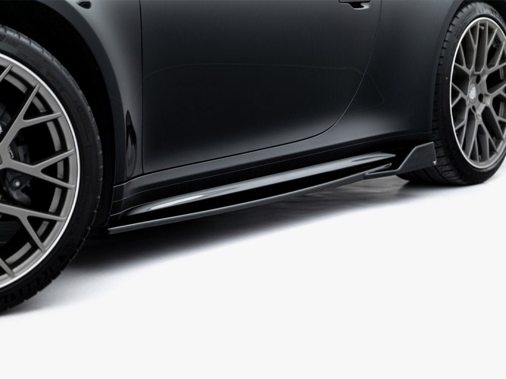 Maxton Design Porsche 911 Carrera Sport V.2 side skirts and diffusers installed on a black Porsche 992 Carrera Sport.