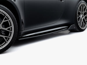 Maxton Design Porsche 911 Carrera Sport V.2 side skirts and diffusers installed on a black Porsche 992 Carrera Sport.