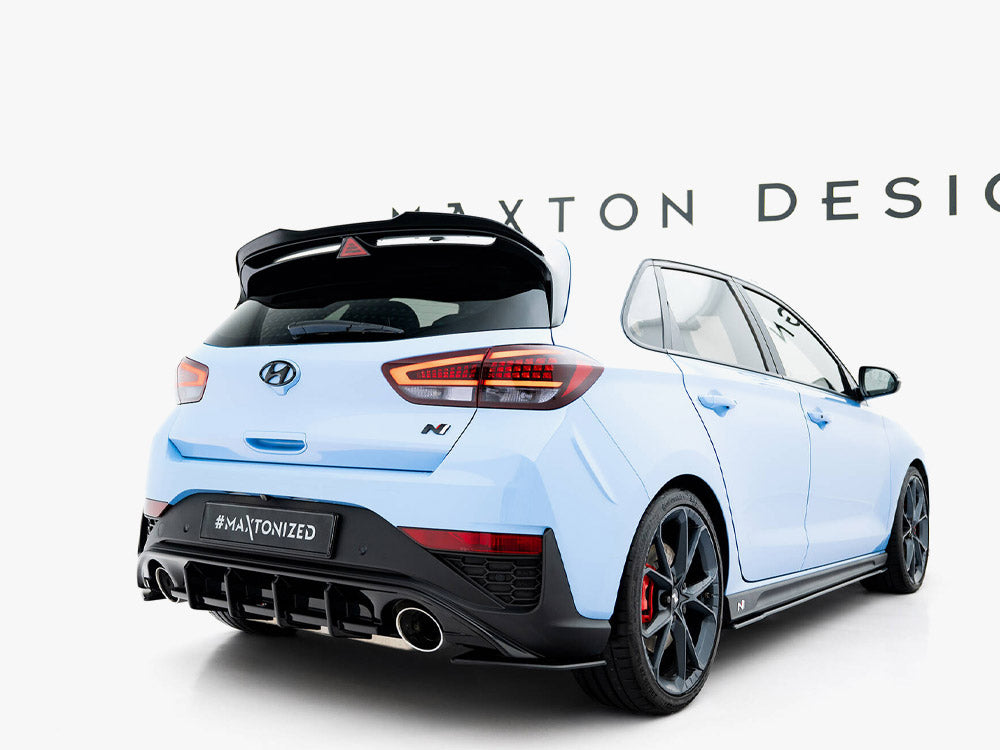 Maxton Design Spoiler Extension V2 for Hyundai I30 N MK3 and MK3 FL hatchback, showcasing sleek body styling enhancement.