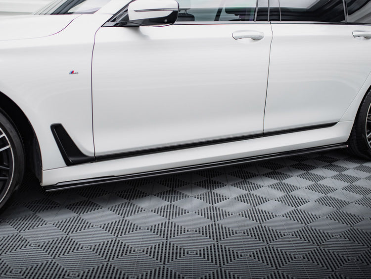 Maxton Design BMW 7 Series G11 2015-2018 side skirts and diffusers for M-pack styling, showcasing sleek aerodynamic enhancements.