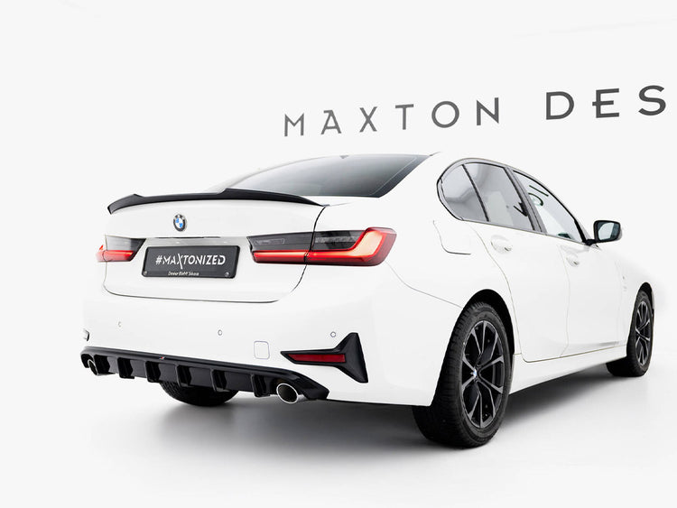 Maxton Design BMW 3 Series G20 spoiler cap installed on the rear trunk, showcasing sleek aerodynamic styling.