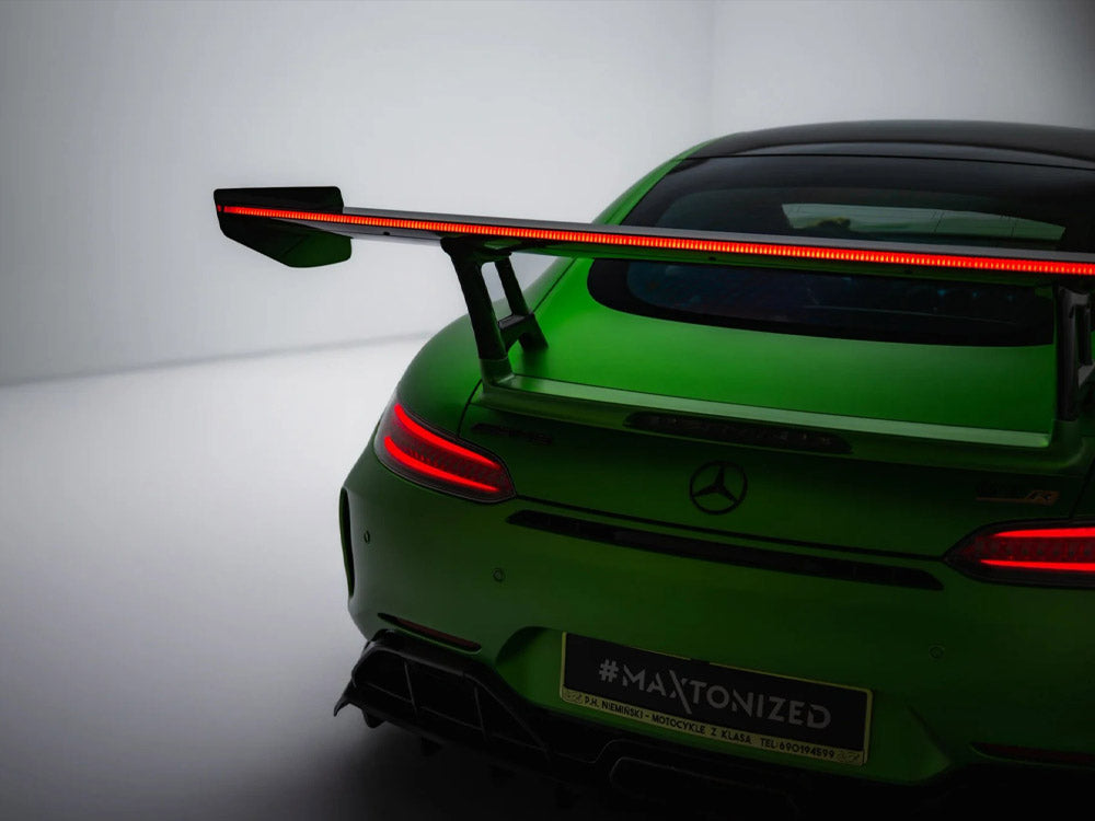 Carbon spoiler and LED lighting for Mercedes-AMG GTR C190 facelift, MAXTON® DESIGN body styling accessory on a car.