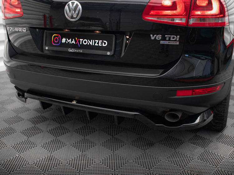 Maxton Design full body kit for Volkswagen Touareg Mk2, including front and rear bumper extensions and side skirts, in black finish.