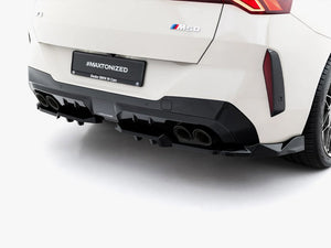 Black Maxton Design rear splitter with vertical bars for BMW X3 M50 G45, showcasing its aerodynamic body styling.