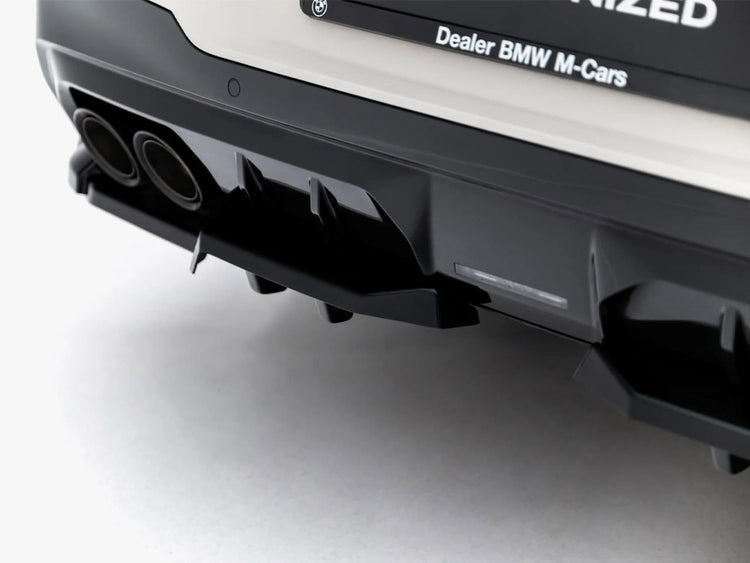 BMW X3 M50 G45 Maxton Design rear splitter with vertical bars, body and styling accessory for sporty exterior enhancement.