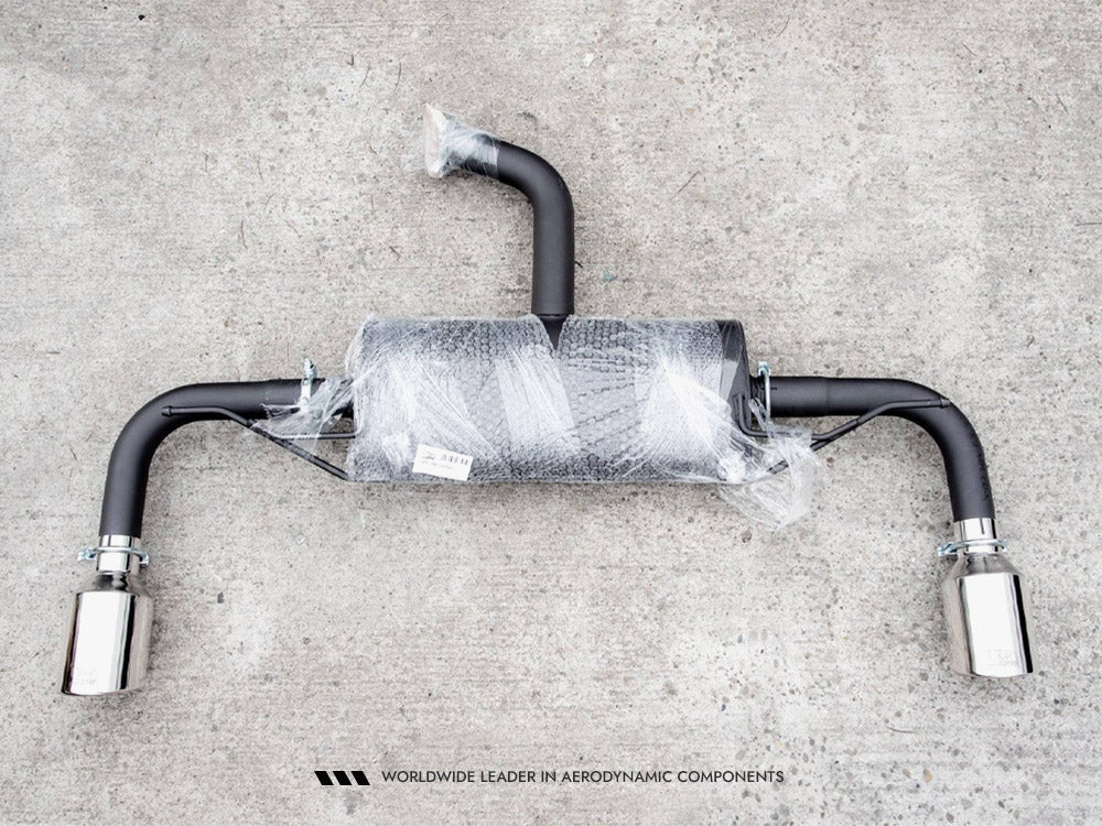 Maxton Design VW Golf 8 V.1 GTI look exhaust system in black with dual tips, mounted on the rear of the car.