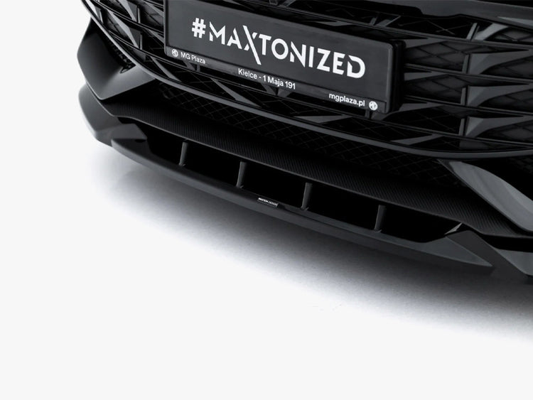 Maxton Design Front Splitter V.1 for MG 3 Mk1, a black aerodynamic body styling part with mounting details, designed for improved downforce.