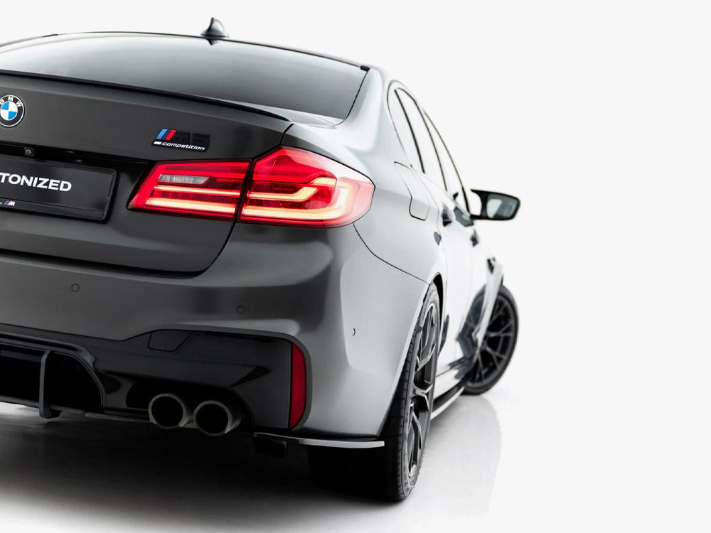 BMW M5 F90 Maxton Design full body kit set, including front bumper, side skirts, and rear diffuser, in a sleek automotive style.