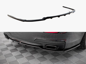 Maxton Design BMW 7 Series F01 rear splitter with vertical bars, made of durable material, mounted on the car's rear bumper.