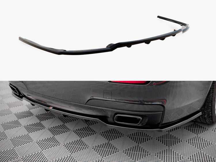 Maxton Design BMW 7 Series F01 rear splitter with vertical bars, made of durable material, mounted on the car's rear bumper.