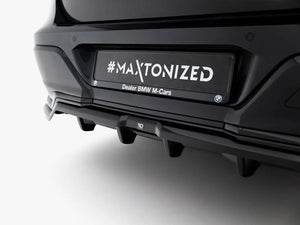 Maxton Design BMW 7 Series G70 rear splitter with vertical bars, body styling accessory for enhanced sportier look.