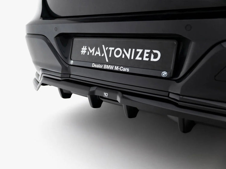 Maxton Design BMW 7 Series G70 rear splitter with vertical bars, body styling accessory for enhanced sportier look.
