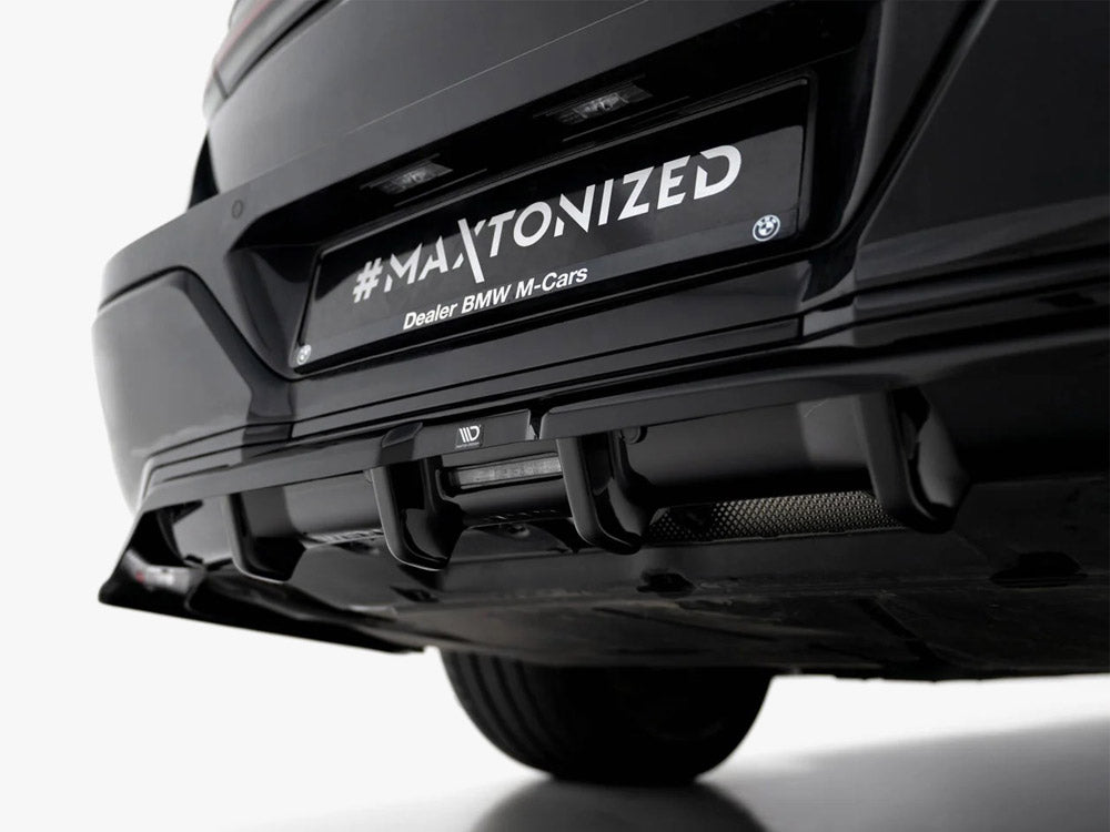 Maxton Design BMW 7 Series G70 rear splitter with vertical bars from the V.1 M-Pack, designed for enhanced body styling.