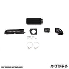 Black AIRTEC Motorsport induction kit installed in a Peugeot 208 GTI THP200, showcasing the intake system and air filters.